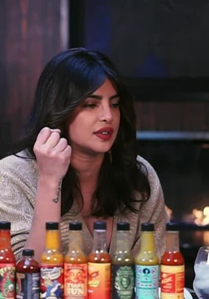 S14:E01 - Priyanka Chopra Jonas Explains the Essence of Hot Sauce While Eating Spicy Wings poster