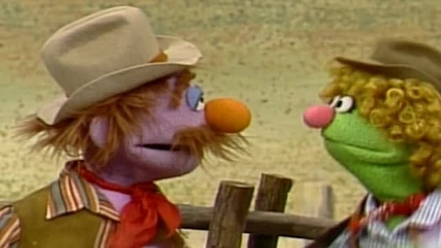 S23:E66 - Elmo Pretends to Be a Flower