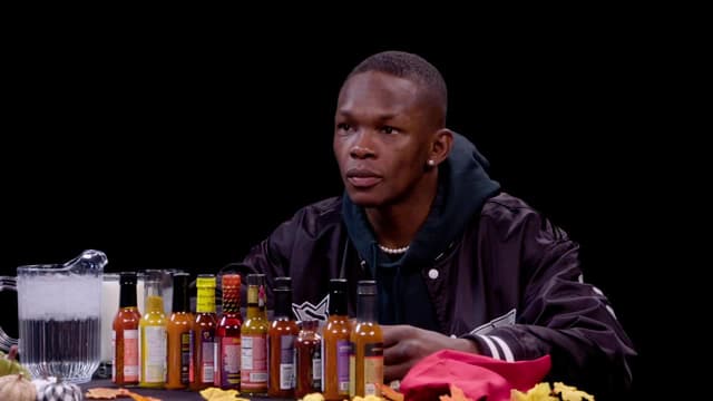 S19:E09 - Israel Adesanya Gives Thanks While Eating Spicy Wings