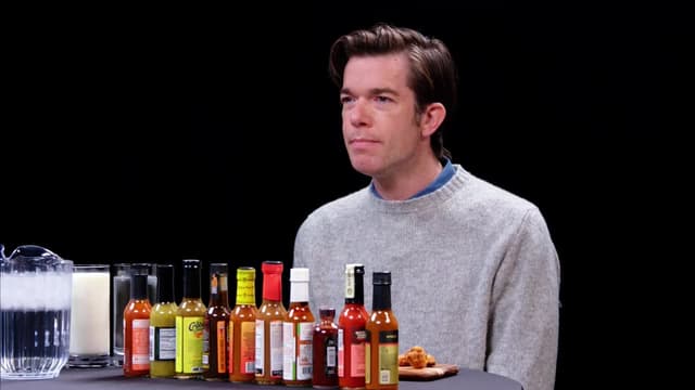 S21:E06 - John Mulaney Seeks the Truth While Eating Spicy Wings