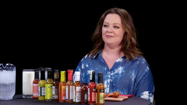 S21:E04 - Melissa McCarthy Prepares for the Worst While Eating Spicy Wings