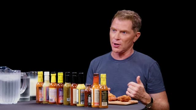 S22:E03 - Bobby Flay Throws Down Against Spicy Wings