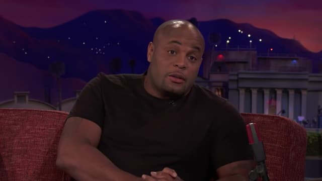 S11:E26 - Conan: Athletes - Amanda Peet & Daniel Cormier (6/11/18)