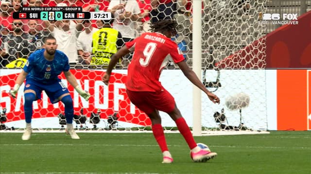 S2026:E143 - Johan Manzambi slots it home past the keeper to extend Switzerland's lead over Canada
