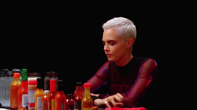 S04:E01 - Cara Delevingne Shows Her Hot Sauce Balls While Eating Spicy Wings