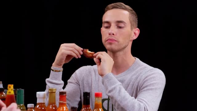 S05:E09 - Adam Rippon Competes in the Olympics of Eating Spicy Wings