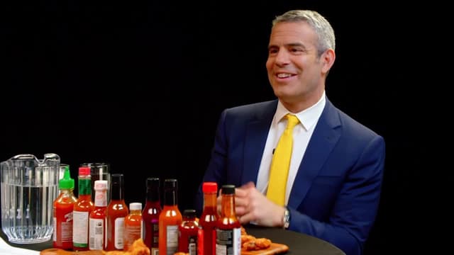 S03:E19 - Andy Cohen Spills the Tea While Eating Spicy Wings