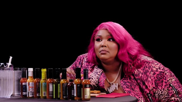 S18:E12 - Lizzo Earns Her Hot Sauce Crown While Eating Spicy Wings