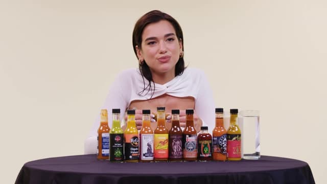 S12:E05 - Dua Lipa Sweats From Her Eyes While Eating Spicy Wings
