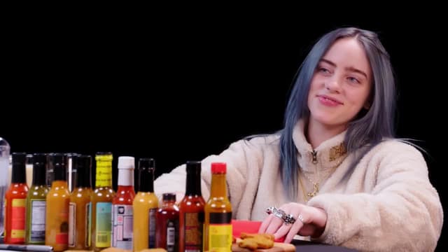 S08:E07 - Billie Eilish Freaks Out While Eating Spicy Wings