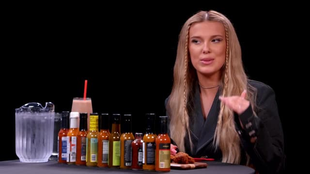 S18:E02 - Millie Bobby Brown Needs a Milkshake While Eating Spicy Wings