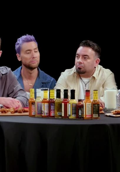 S22:E01 - *NSYNC Breaks Another Record While Eating Spicy Wings poster