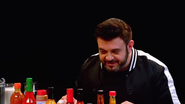 S04:E05 - Adam Richman Fanboys Out While Eating Spicy Wings