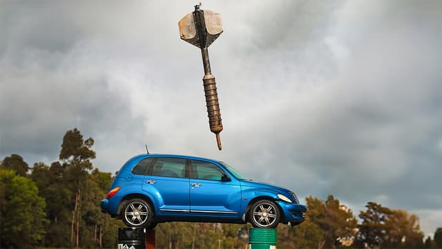 S01:E16 - World's Largest Dart vs. Car From 60m!
