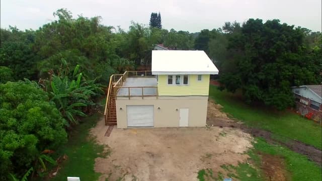 S02:E02 - Mark and Jen's Tiny Surf House