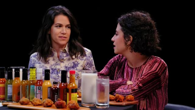 S08:E02 - Abbi and Ilana of "Broad City" Go Numb While Eating Spicy Wings