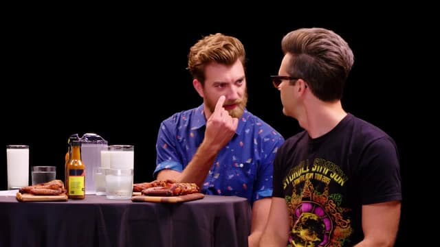S06:E11 - Rhett & Link Hiccup Uncontrollably While Eating Spicy Wings