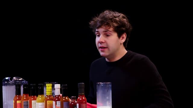 S11:E06 - David Dobrik Experiences Real Pain While Eating Spicy Wings