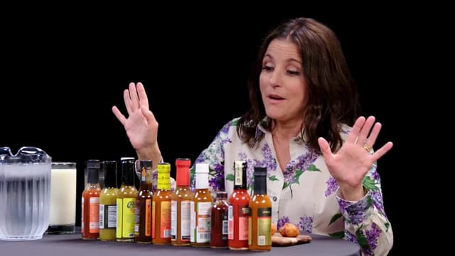 S21:E02 - Julia Louis-Dreyfus Fires Her Publicist While Eating Spicy Wings