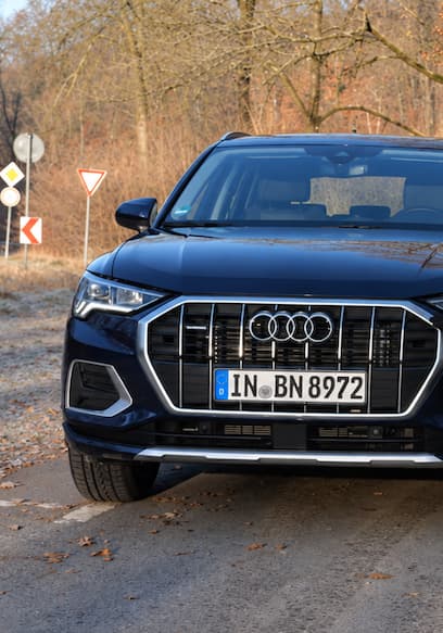 S01:E14 - BMW X1 vs. Audi Q3: Compact Luxury SUVs Compared poster