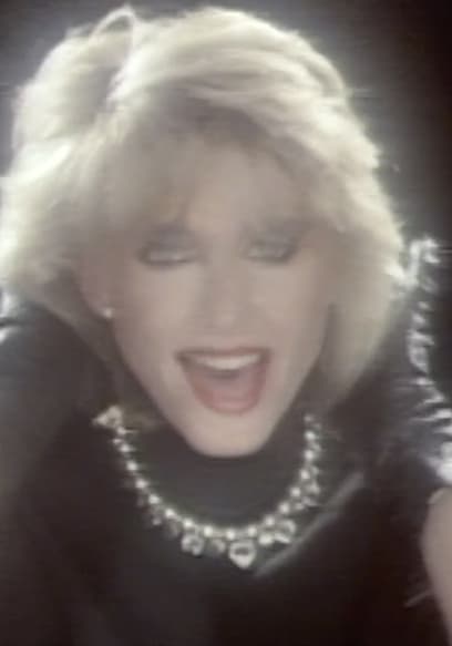 S01:E17 - Olivia Newton John poster
