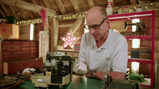 T04:C10 - S04:E10 - Cine Projector, Spinning Wheel, Wicker Chair