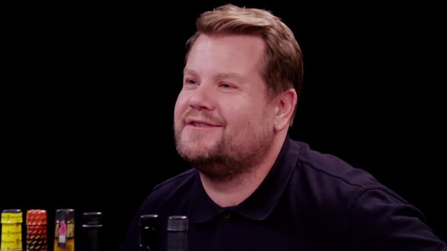 S19:E07 - James Corden Experiences Mouth Karma While Eating Spicy Wings