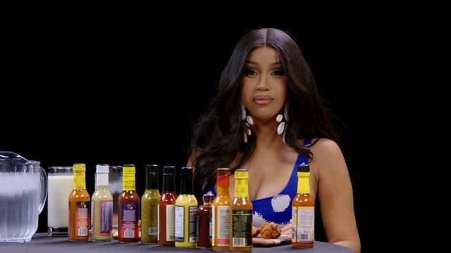 S22:E02 - Cardi B Tries Not to Panic While Eating Spicy Wings