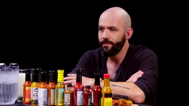 S09:E08 - Binging With Babish Gets a Tattoo While Eating Spicy Wings