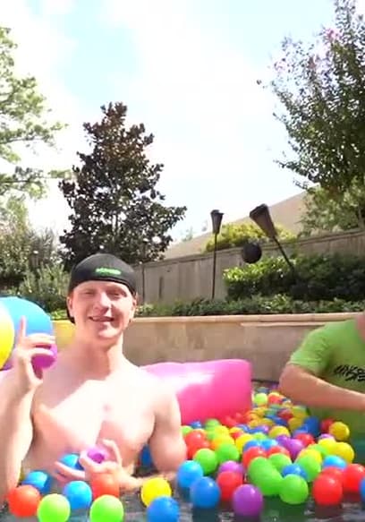 S01:E04 - The Biggest Backyard Water Slide Challenge / Last to Leave the Pool Wins $10,000! poster