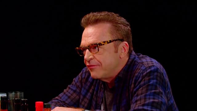 S03:E20 - Tom Arnold Melts Down While Eating Spicy Wings