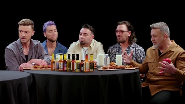 S22:E01 - *NSYNC Breaks Another Record While Eating Spicy Wings