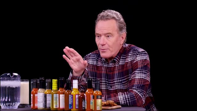 S20:E02 - Bryan Cranston Fully Commits While Eating Spicy Wings